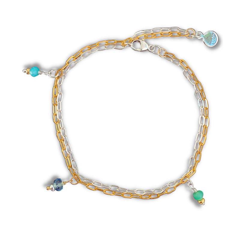14k gold fill and sterling silver chain bracelet with aqua chalcedony, blue topaz, and chrysoprase faceted gemstones. Closure at 7.5" and 8.5".