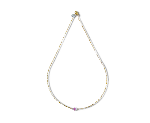 Gorgeous faceted pink sapphire surrounded by rainbow moonstones adorn this gold chain.18" length.